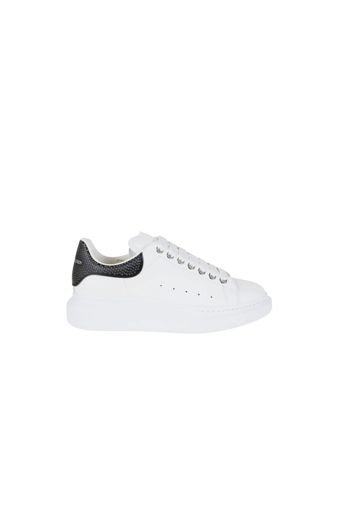 Alexander Mcqueen Sneakers Ovesize in Pelle bianche nere vista laterale