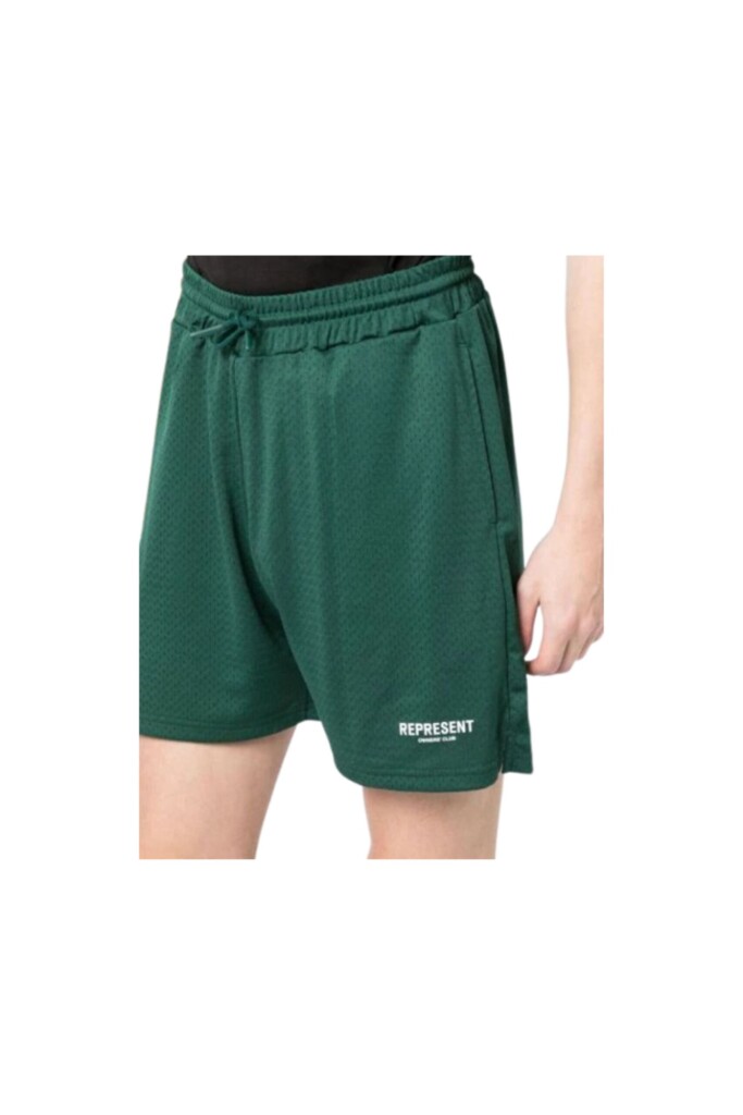Represent Shorts con Logo Owners Club Mesh verdi indossato